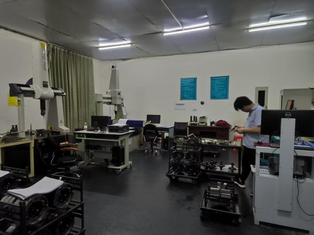 Zeiss CMM probe measuring a complex engine part